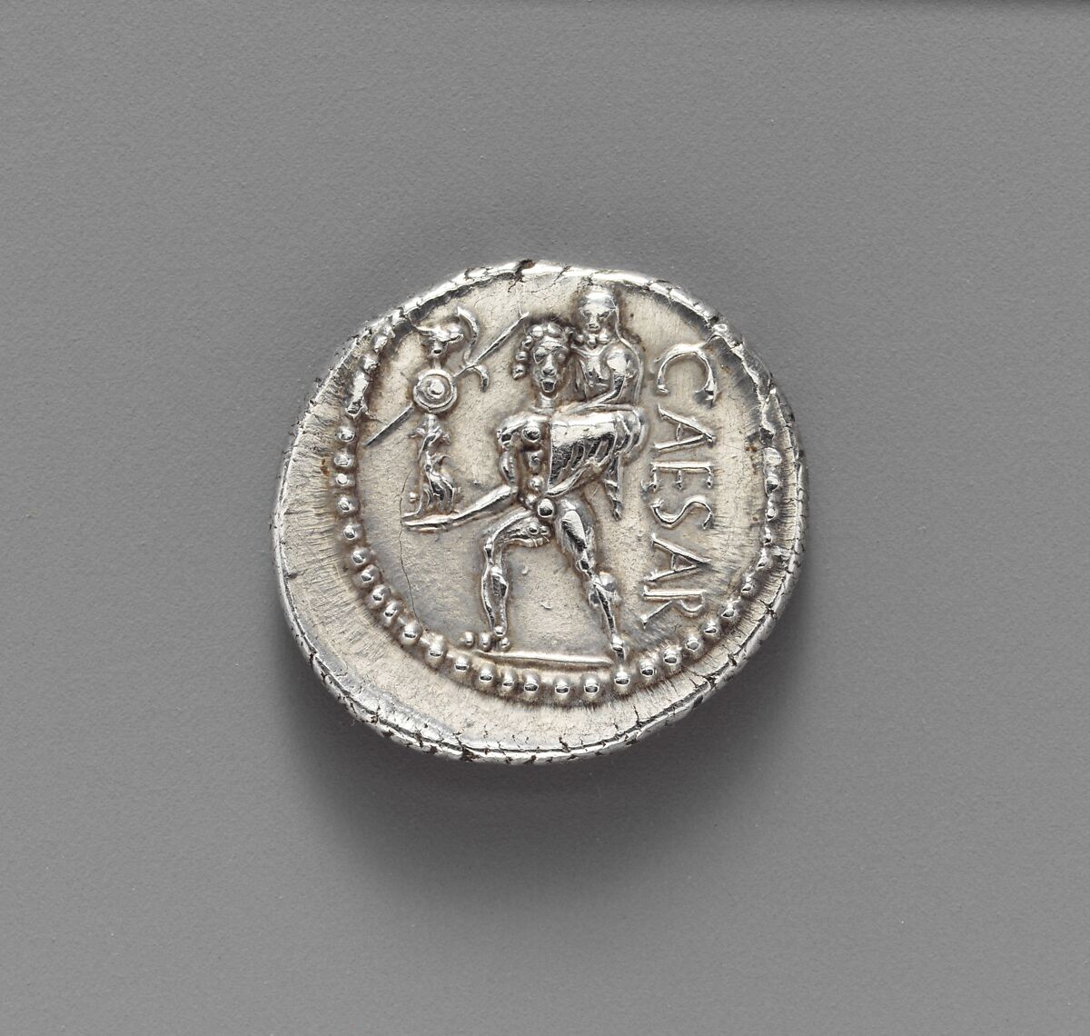 Roman silver denarius issued under Julius Caesar