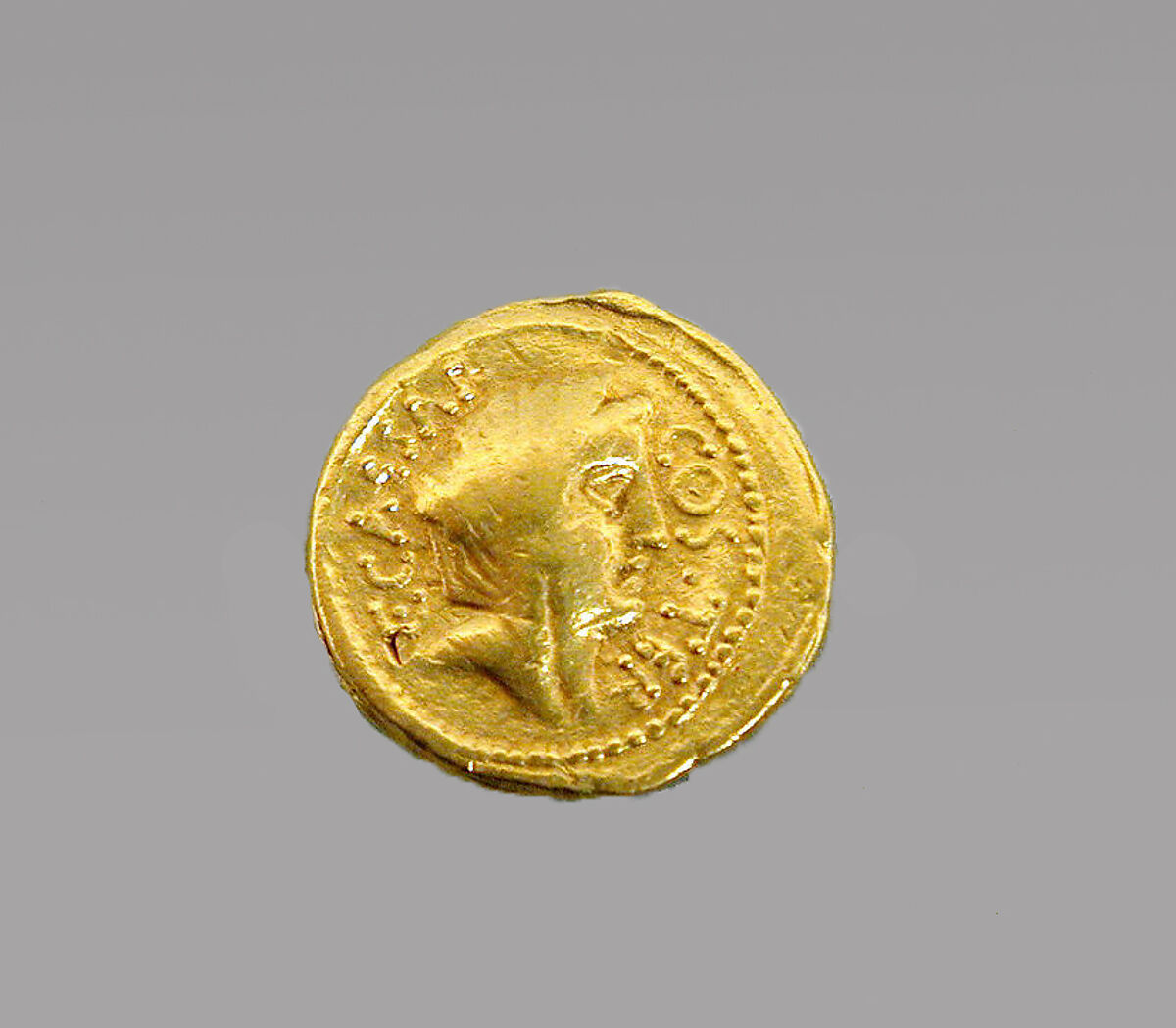 Gold Roman coin issued under Caesar in 46 BCE