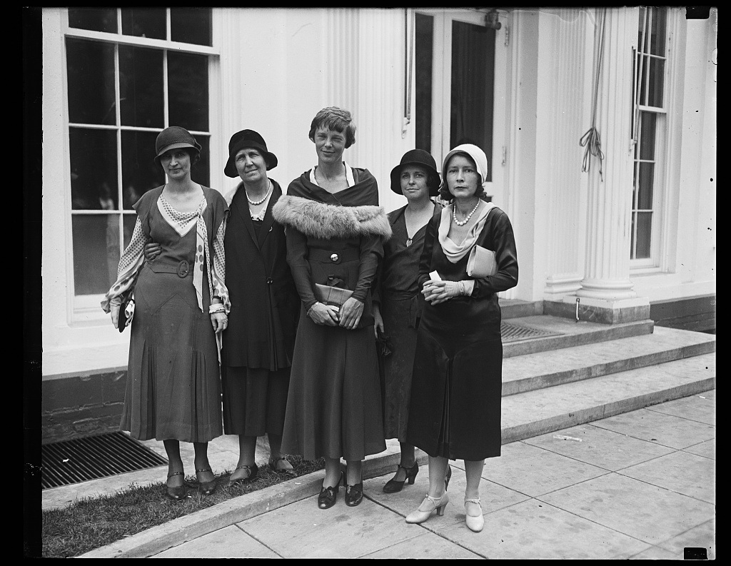 Earhart at center in a group on the White House steps