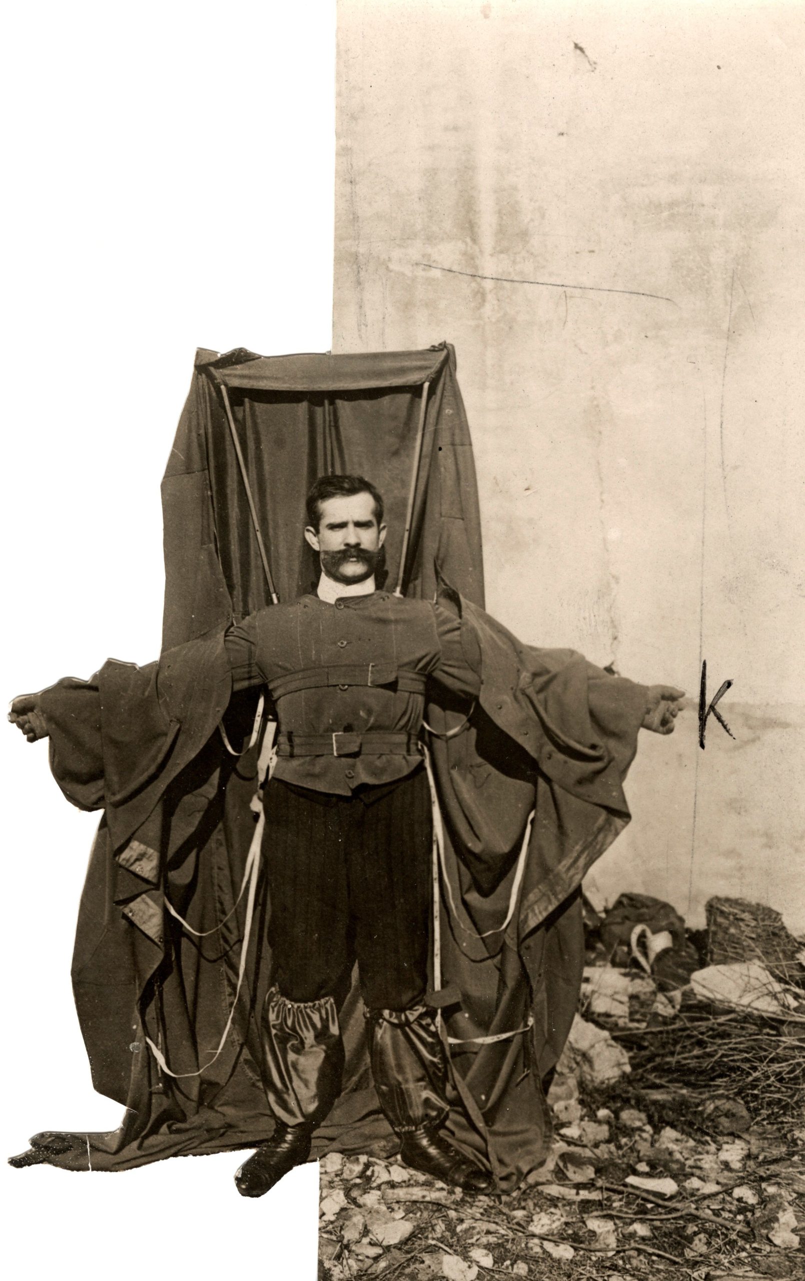 Franz Reichelt displaying the opened fabric of his parachute suit