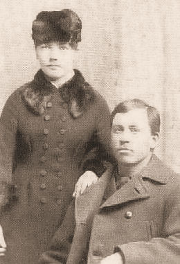 Laura and Almanzo Wilder posed together in a studio portrait, circa 1885.