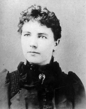 Black-and-white portrait of author Laura Ingalls Wilder.