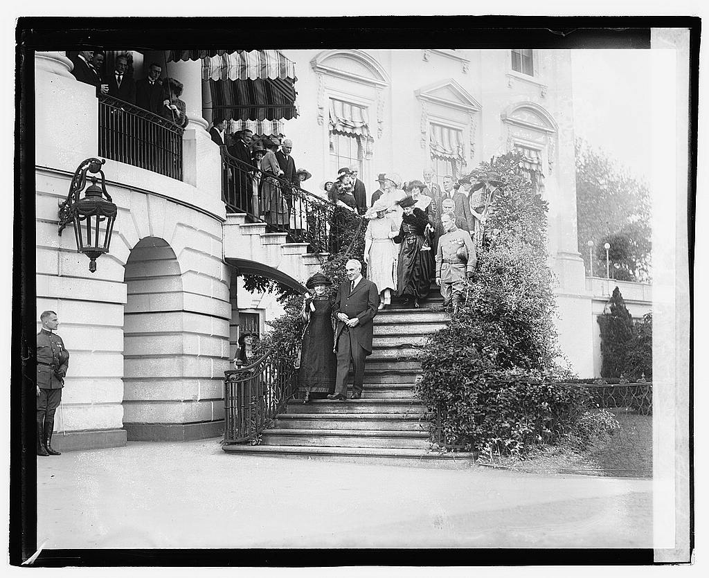 President Warren Harding standing with Marie Curie in 1921