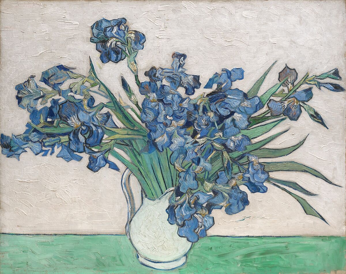 Blue irises in a white vase